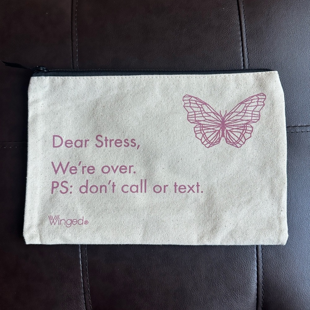 Winged Canvas Pouch with “Dear Stress, We’re over. PS: don’t call or text.”